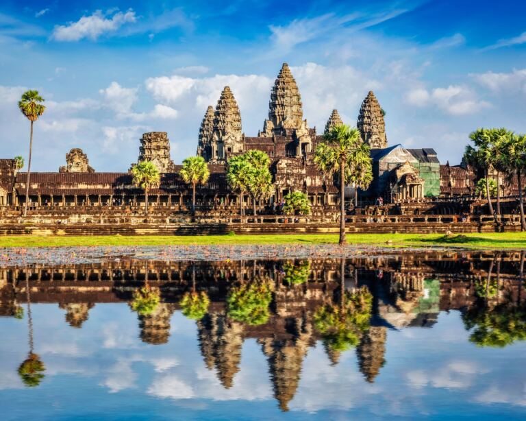 Angkor Wat temple - Cambodia iconic landmark with reflection in water.