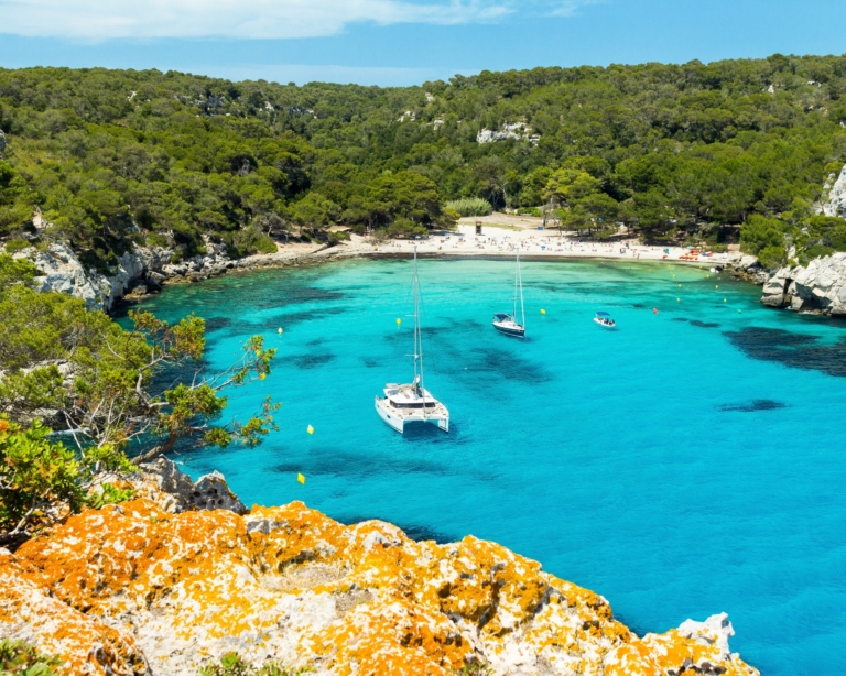 Cala Macarella beach at Menorca island, Spain⁠.