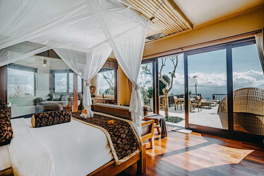 Luxurious hotel room in Munduk with stunning mountain and valley views.